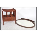A vintage Regency style mahogany Canterbury with s