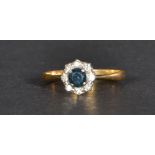 An 18ct gold diamond and sapphire ring having a ce