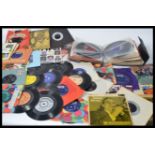 A good collection of 45's - records to include man