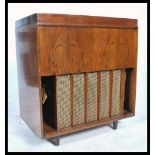 A vintage mid 20th century walnut cased Marconi Ma