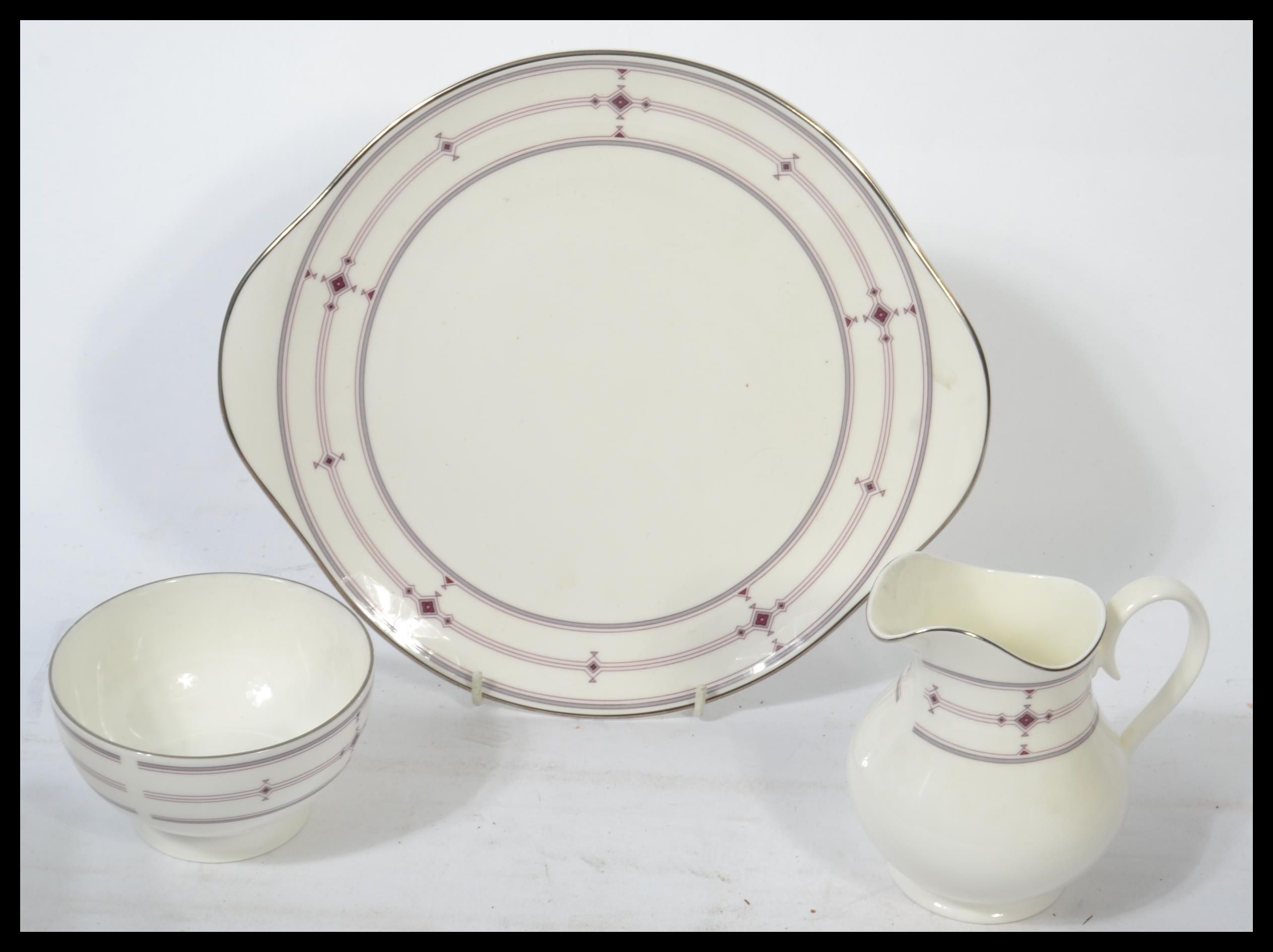 A Royal Doulton tea and dinner service in the Infi - Image 4 of 6