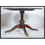 A 19th century Regency mahogany large tilt top bre