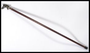 A vintage 20th century walking stick cane having a