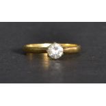 An 18ct gold single stone diamond ring of approx .