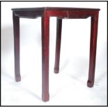 A Chinese square hardwood and marble topped side t