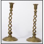 A pair of tall 19th century cast and spun brass ba