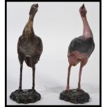 A pair of 20th century bronze cast figurines - scu