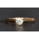 A 9ct gold single stone ring having a diamond of a