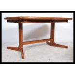 A retro 1960's teak wood long extending dining tab