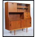 A vintage mid century teak wood sideboard of Danis