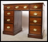 A 19th Century mahogany twin pedestal desk, inset with a tooled leather skiver, an arrangement of