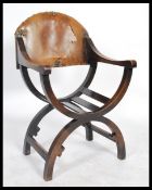 A mid 20th century Savonarola Italian throne chair of beech wood construction having shaped base