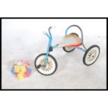 A collection of vintage childrens toys to include a Mobo Trike, a dolls high chair etc please