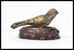 An early 20th century cold painted Austrian bronze figurine of a budgie bird in the manner of