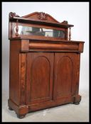 A 19th Century rosewood mirrored back chiffonier with shelved mirror back above single drawer and