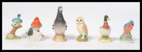 A group of Beswick ceramic animals to include a ro