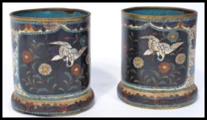 A pair of 19th century Chinese Cloisonne brush points having enameled decoration of Tancho crane