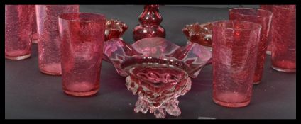 A collection of cranberry glass dating from the 19