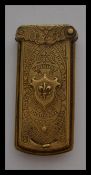 A late 19th Century The Quadruple Golden Casket needle case by W. Avery & Son, Redditch. Gilt brass.