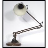 Two vintage retro 20th century anglepoise lamps one being a 1001 lamps example and the other in a