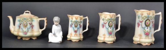 A collection of 3 Victorian graduating jugs of Sta