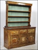 A 19th century Victorian scratch-built miniature child's dresser consisting of three drawers over