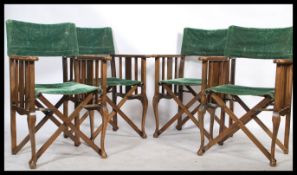 A mid century retro bridge suite. The folding ' directors ' style chairs with green velvet fabric