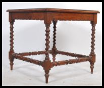 A late 19th century Victorian oak occasional / side / lamp table of unusual form, square top with