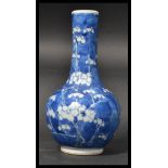 A 19th century Chinese blue and white baluster vas