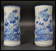 A pair of 19th century Chinese blue and white ceramic tall bamboo effect brush pots / vases hand