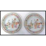 A pair of 19th century Chinese plates having hand