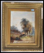 A 19th century oil on canvas English School painting by W Wilson of a country scene. The paiting