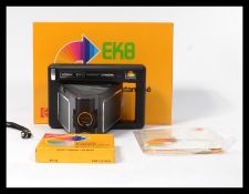 A vintage retro 20th century Kodak EK8 Polaroid type instant camera complete in original box with