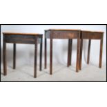 A collection of 3 early to mid 20th century wooden school desks. Each of square upright form being