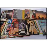 A collection of vintage LP vinyl records dating from the 1960's on wards to include the Beatles ,