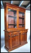 A 19th Century Victorian mahogany large two stage cabinet back library bookcase, two glazed doors