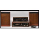 A vintage mid century Skandia 8 track player hi fi system in teak wood facia case complete with