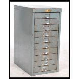 A vintage / retro 20th Century industrial ten drawer metal filing cabinet in original finish with