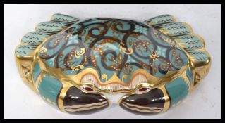 A Royal Crown Derby paperweight of Cromer Crab complete with the gold stopper and certificate.