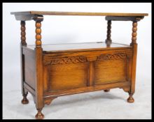 A good early 20th century monks bench - hall settle in solid oak with carved body, shaped elbow