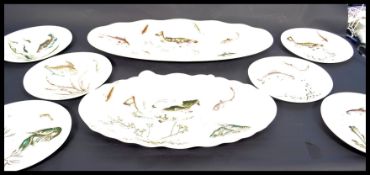 A fantastic service of Johnson Bros Fish pattern ceramics to include large platters / trays , plates