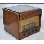 A vintage 20th century walnut cased Sorbell valve radiogram, having a later fitted four speed record