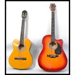 Two vintage acoustic six string guitars to include an Encore and a Chantry. The Encore having a