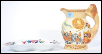 An early musical commemorative water jug commemorating the coronation of His Majesty King Edward