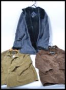 A group of three vintage style coats to include a XL leather 3/4 jacket in a moss finish together