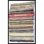 A collection of vinyl LP's to include the Beatles and the Rolling Stones along with other titles and