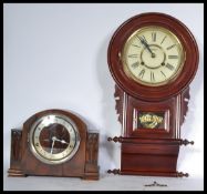 Two vintage clocks one being and Art Deco mantle clock of square form and the other being a 20th