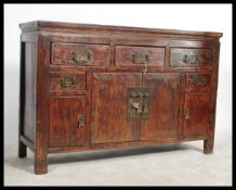 A late 19th / early 20th Century circa 1900 Chinese elm sideboard from the Shanxi Province having an