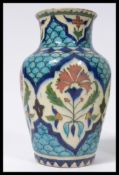 A 19th century Persian bulbous vase, painted in th