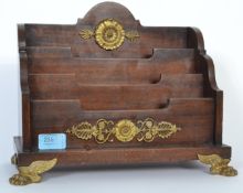 A good 19th Century mahogany sectional desk tidy / letter rack decorated with brass embellishments